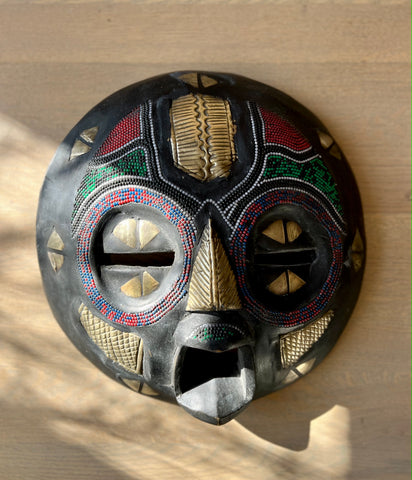VINTAGE LARGE AFRICAN ROUND BLACK MASK WITH BRASS INSERTIONS